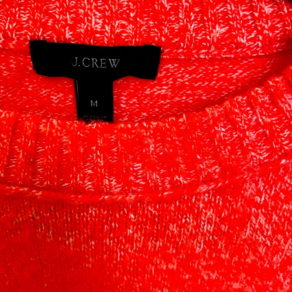 Super cute side button detail on this jcrew orange sweater